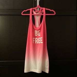 Ombré (pink to white) Gap sportswear sized xs with “be free” in the middle